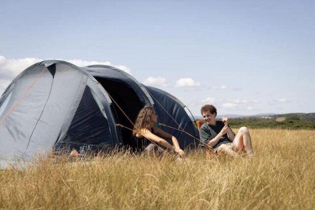 Couple camping with Vango Beta tent