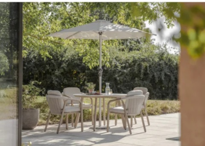 Bramblecrest Monaco 120cm Round Table with 4 Armchairs, Parasol & Base